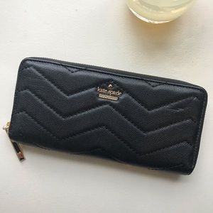 never used KSNY black pebbles leather  zip wallet